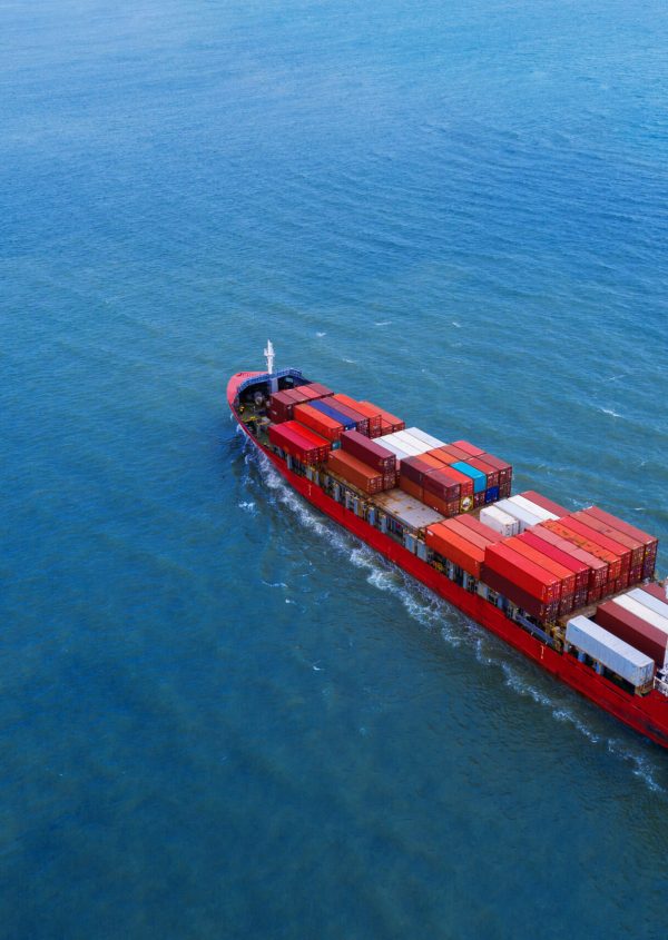 Aerial view of container cargo ship in sea.